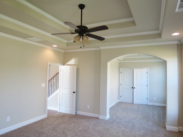 904 Rainbow Springs Road Macon, GA 31216 - Photo 14 of 16 a view of a hallway with a chandelier fan