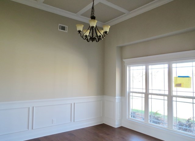 904 Rainbow Springs Road Macon, GA 31216 - Photo 3 of 16 a view of an empty room with chandelier fan and fire place