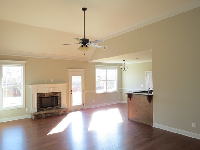 904 Rainbow Springs Road Macon, GA 31216 - Photo 8 of 16 a view of empty room with a fireplace and wooden floor