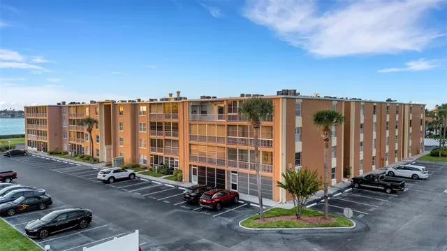 a view of a street with cars