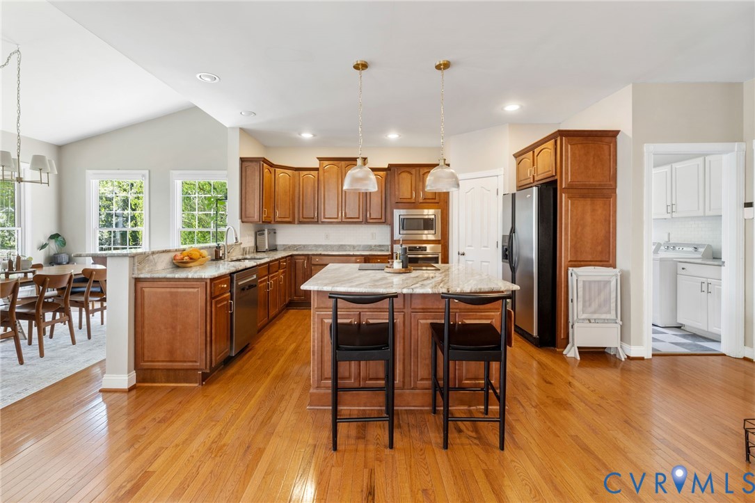 5418 Trail Ride Court Moseley, VA 23120 - Photo 15 of 52 Open to the great room with new backsplash, hardwa