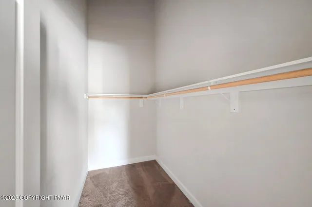 a view of small space with racks on the wall