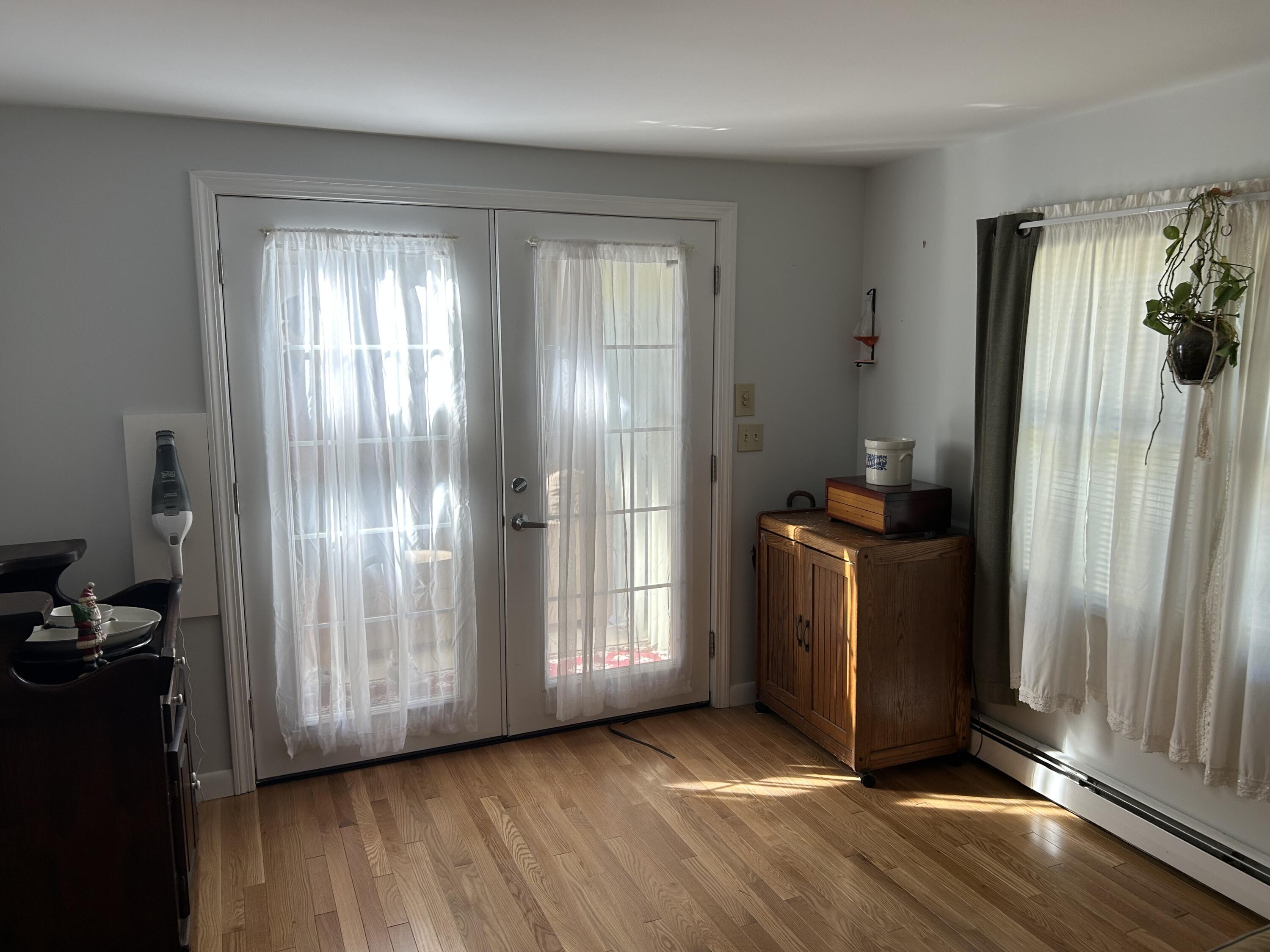 7 Delta Street Hyannis, MA 02601 - Photo 13 of 29 a view of an empty room with a window and storage