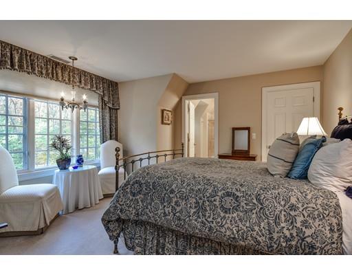 63 Goodnow Road Sudbury, MA 01776 - Photo 21 of 30 a bedroom with a large bed and a large window