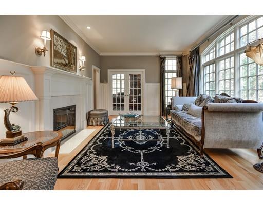 63 Goodnow Road Sudbury, MA 01776 - Photo 4 of 30 a living room with furniture and a fireplace