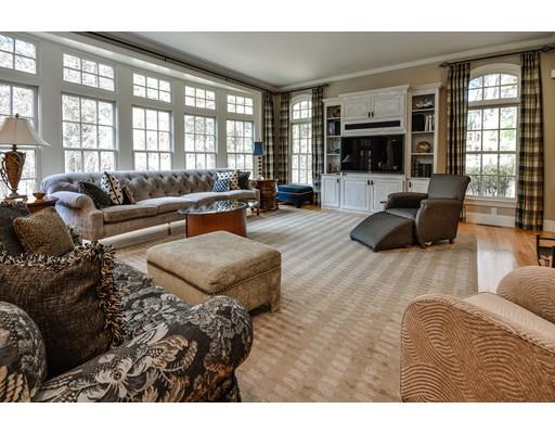 63 Goodnow Road Sudbury, MA 01776 - Photo 8 of 30 a living room with furniture large window and flat screen tv