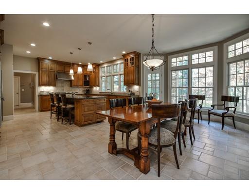 63 Goodnow Road Sudbury, MA 01776 - Photo 10 of 30 a view of a dining room with furniture and chandelier