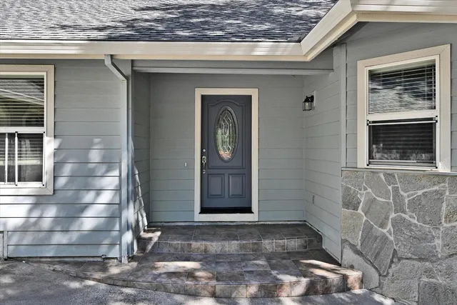 a front view of a house with a door