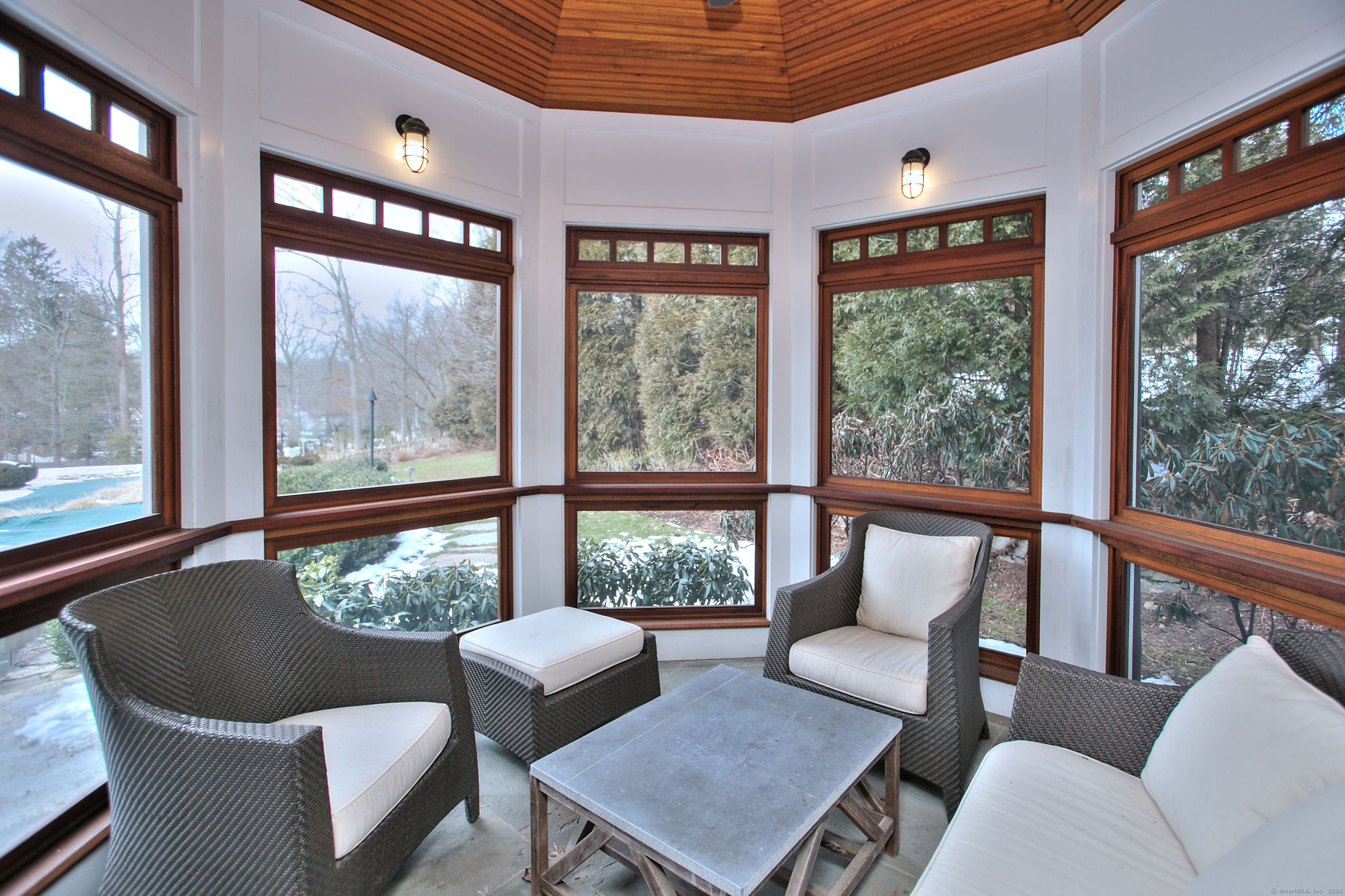 15 Catamount Road Westport, CT 06880 - Photo 14 of 39 a living room with furniture and a floor to ceiling window
