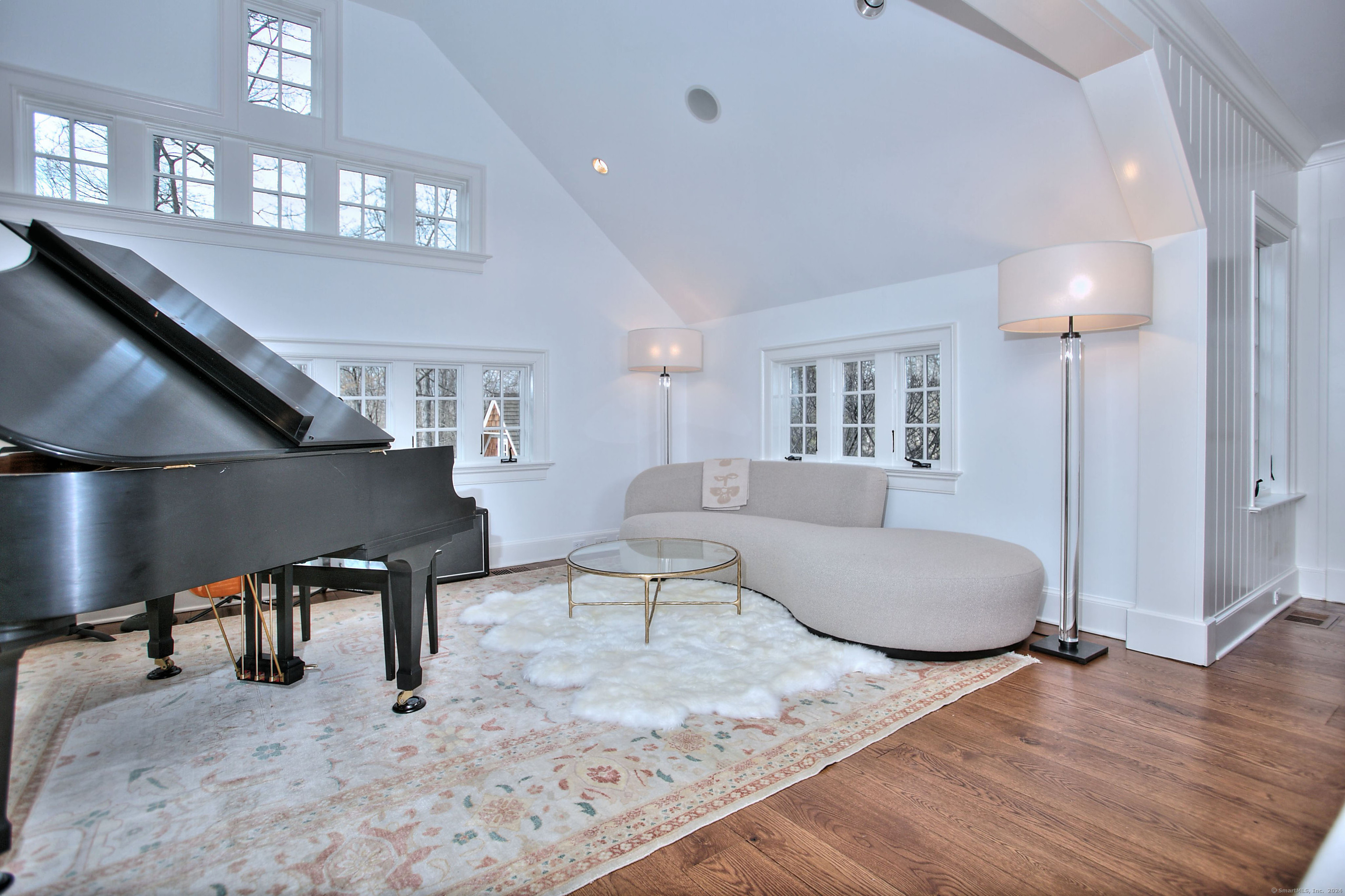 15 Catamount Road Westport, CT 06880 - Photo 19 of 39 a living room with furniture and a wooden floor