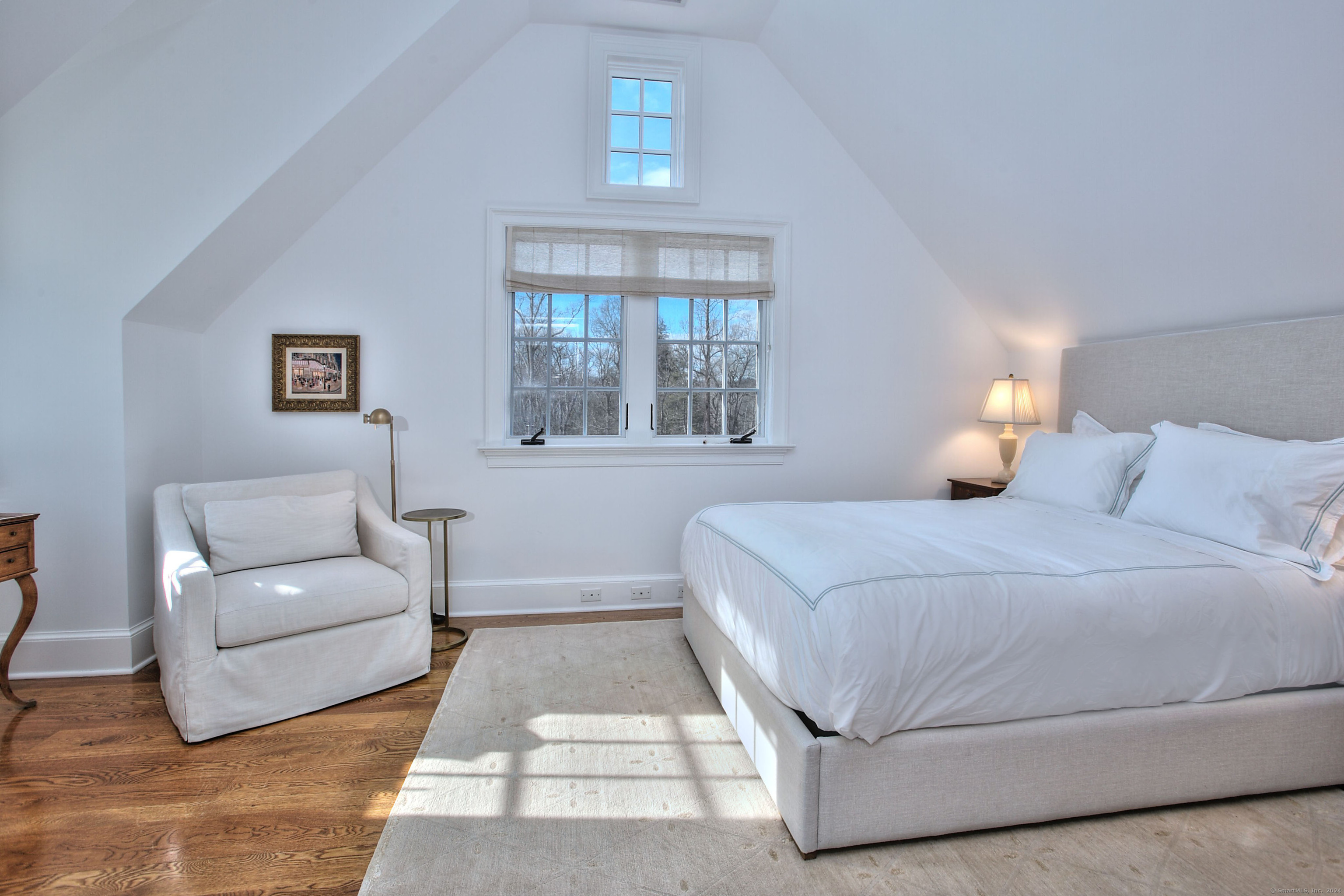15 Catamount Road Westport, CT 06880 - Photo 24 of 39 a bedroom with a large bed and a couch