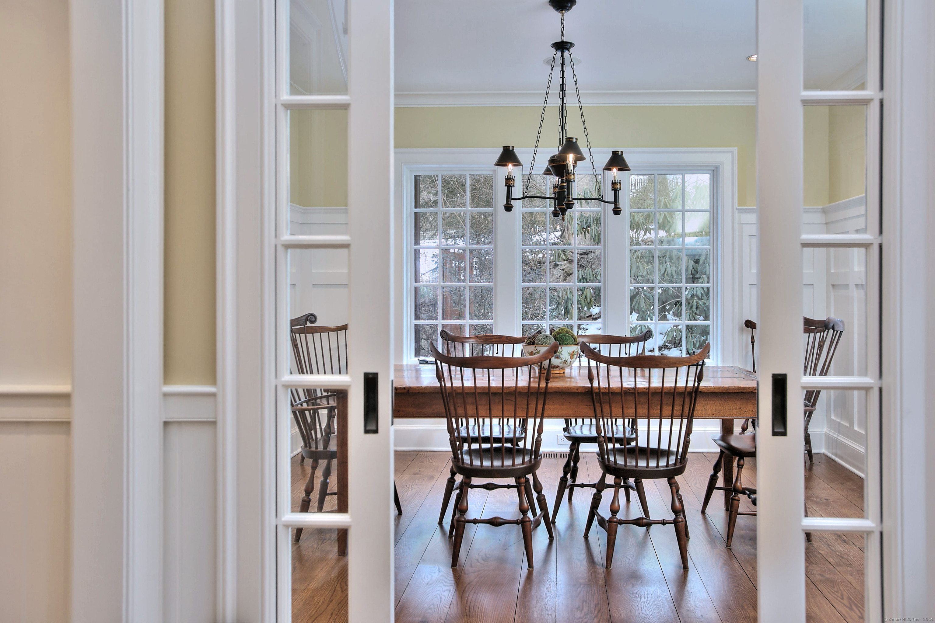 15 Catamount Road Westport, CT 06880 - Photo 7 of 39 a view of a dining room with furniture window and wooden floor