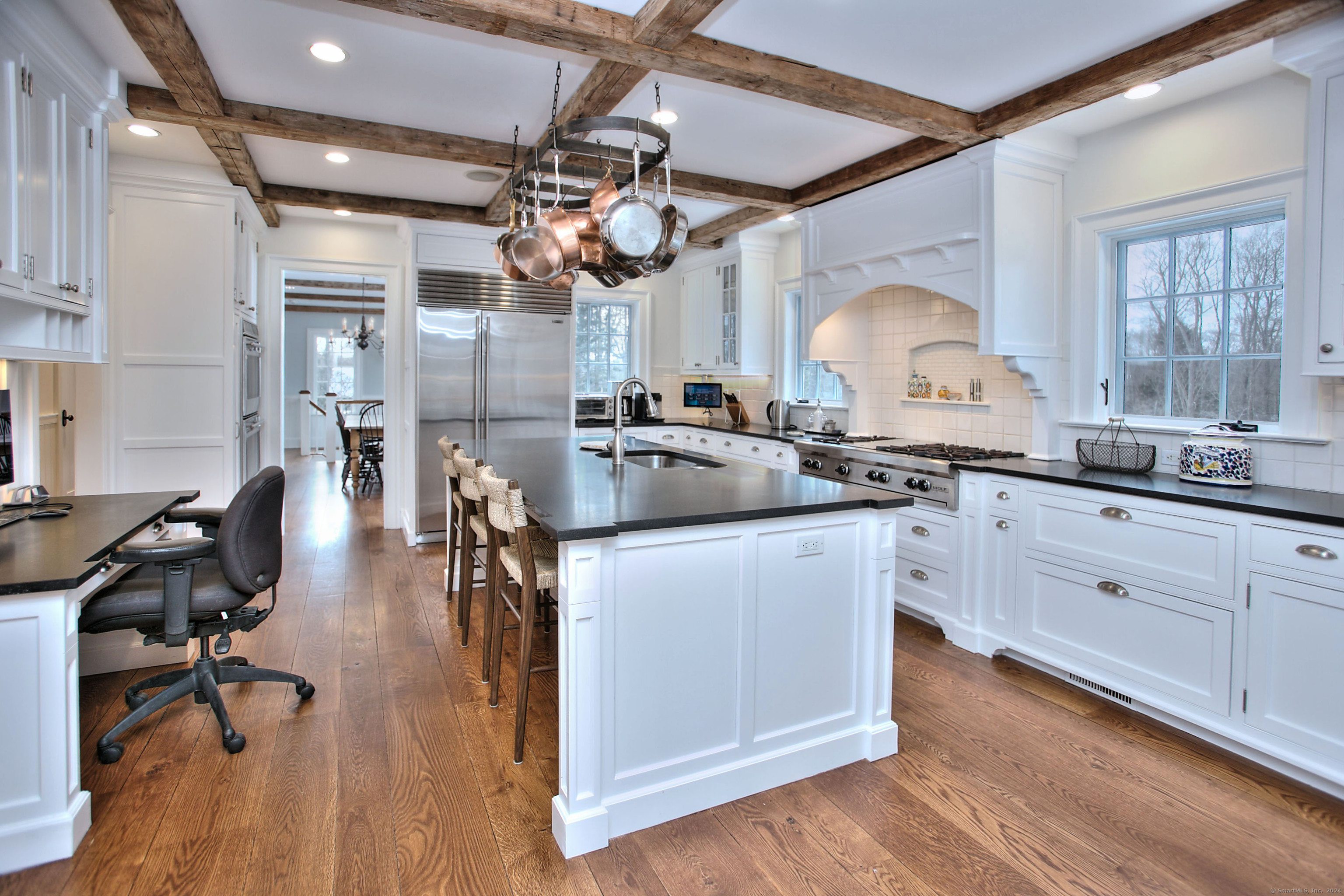 15 Catamount Road Westport, CT 06880 - Photo 10 of 39 a kitchen with a sink cabinets and wooden floor