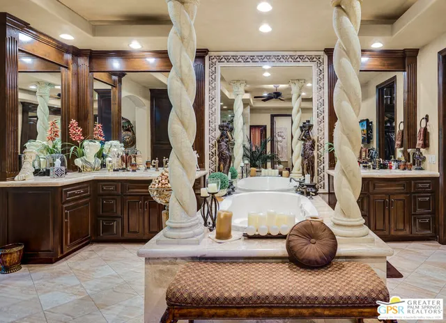 a very nice looking room with a large window and furniture