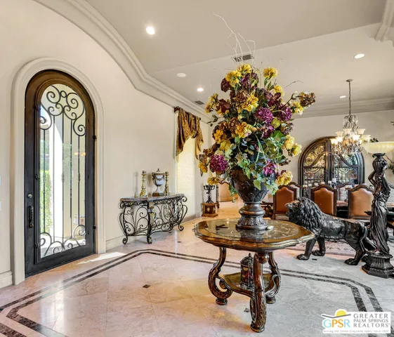 a room with lots of potted plants