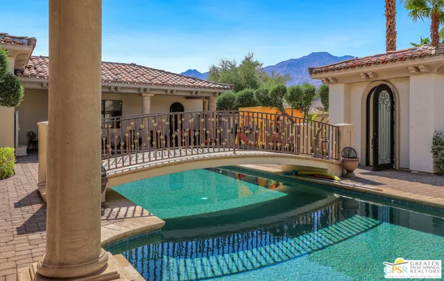 a bathroom with a sink toilet and a mirror
