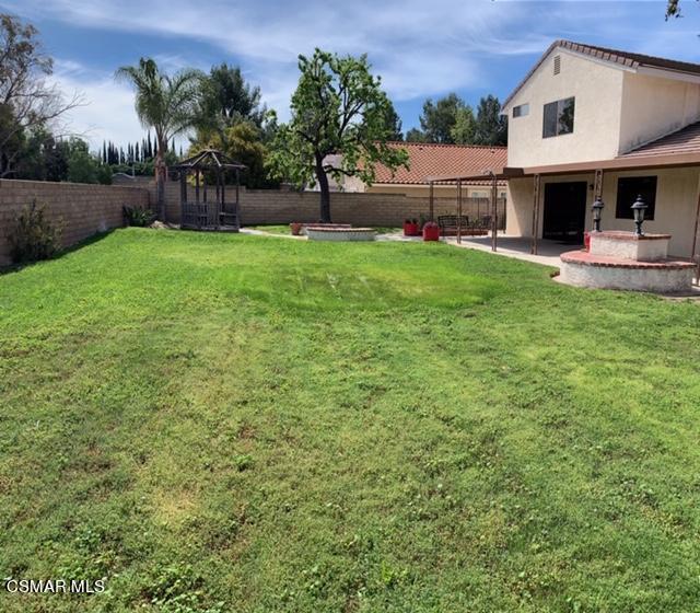 2624 Lemon Drive Simi Valley, CA 93063 - Photo 21 of 22 a view of a house with a yard porch and sitting area