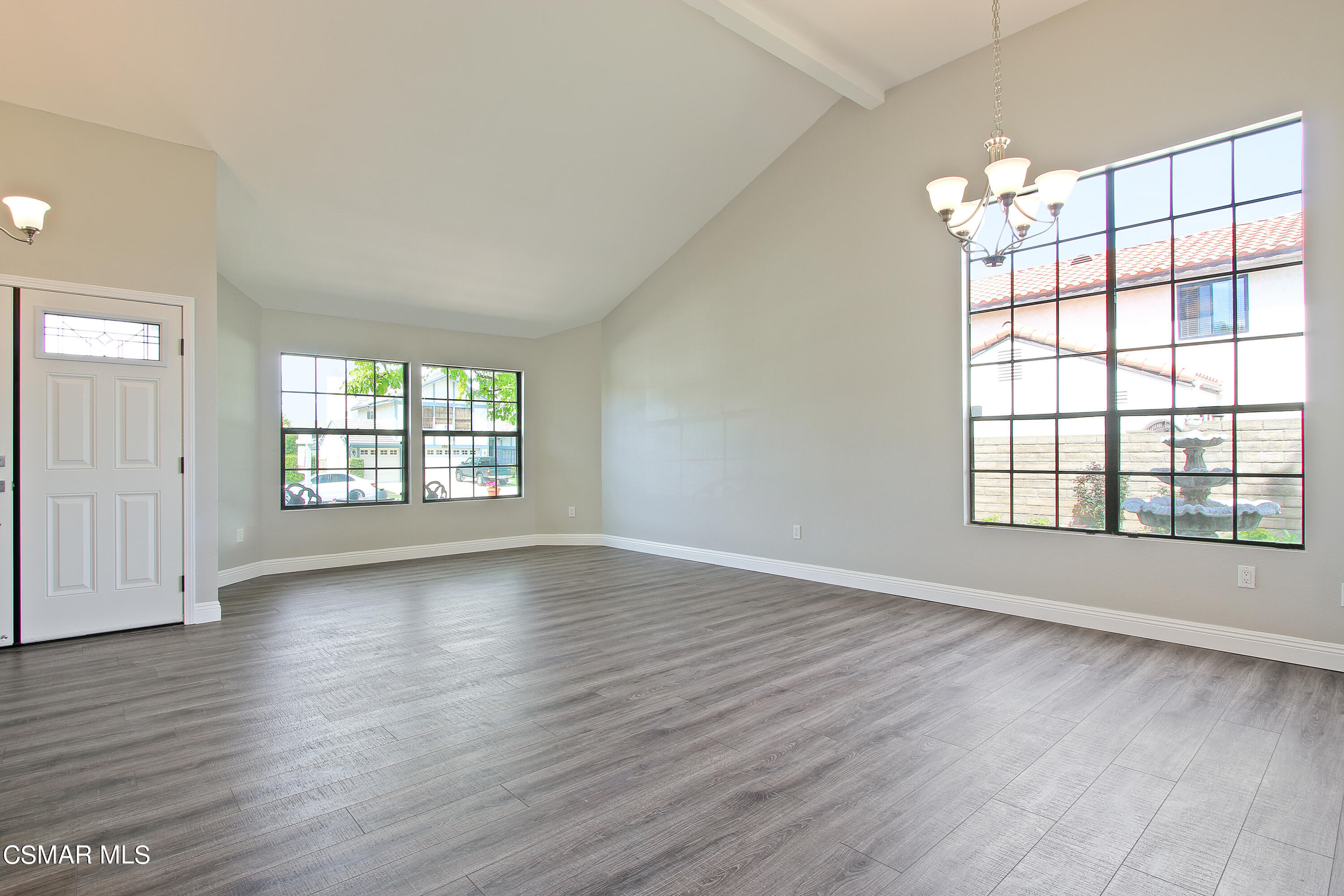 2624 Lemon Drive Simi Valley, CA 93063 - Photo 4 of 22 an empty room with wooden floor and windows