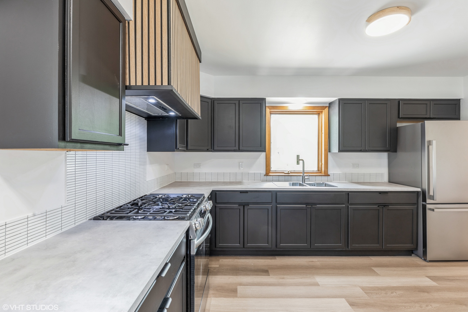 900 Coach Road Homewood, IL 60430 - Photo 6 of 16 a kitchen with a sink and a refrigerator