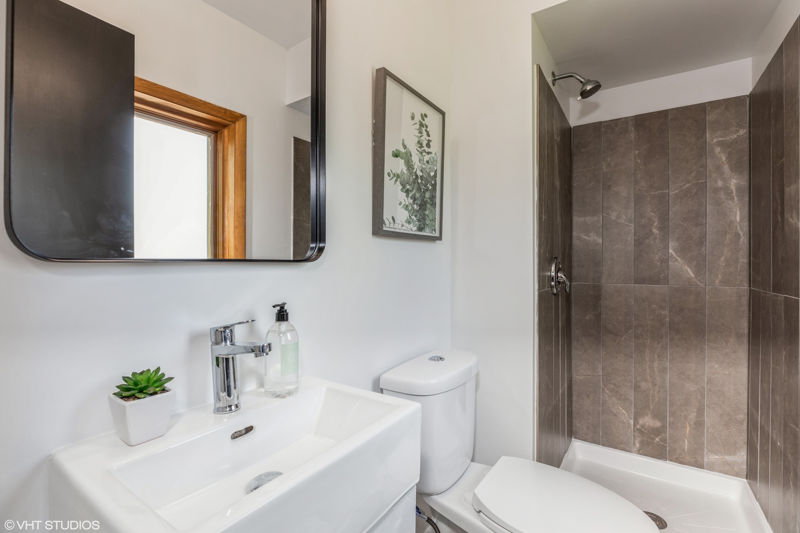 900 Coach Road Homewood, IL 60430 - Photo 9 of 16 a bathroom with a sink toilet and shower