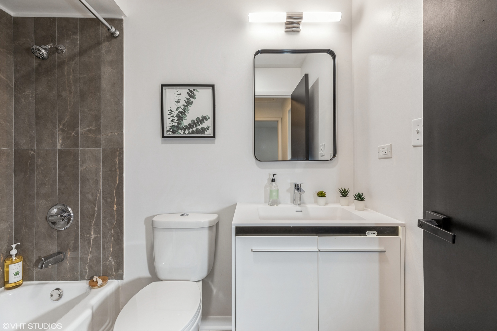 900 Coach Road Homewood, IL 60430 - Photo 10 of 16 a bathroom with a toilet sink and mirror
