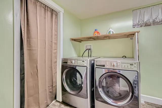 a white toilet sitting next to a shower curtain