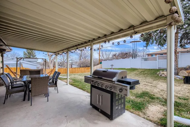 a view of a backyard of the house