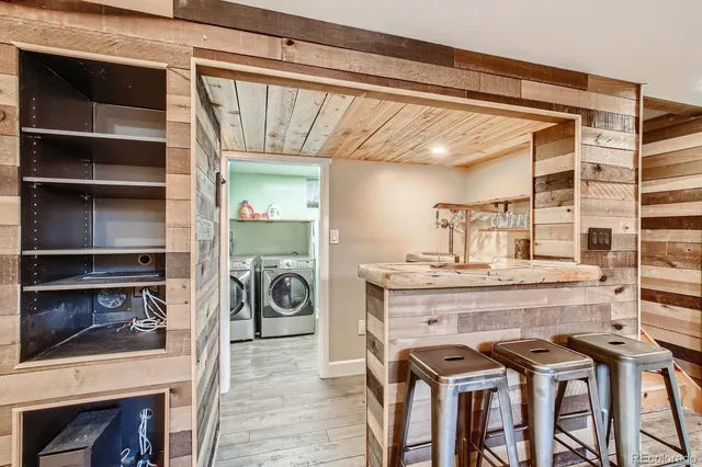 a view of a chair and table in a kitchen