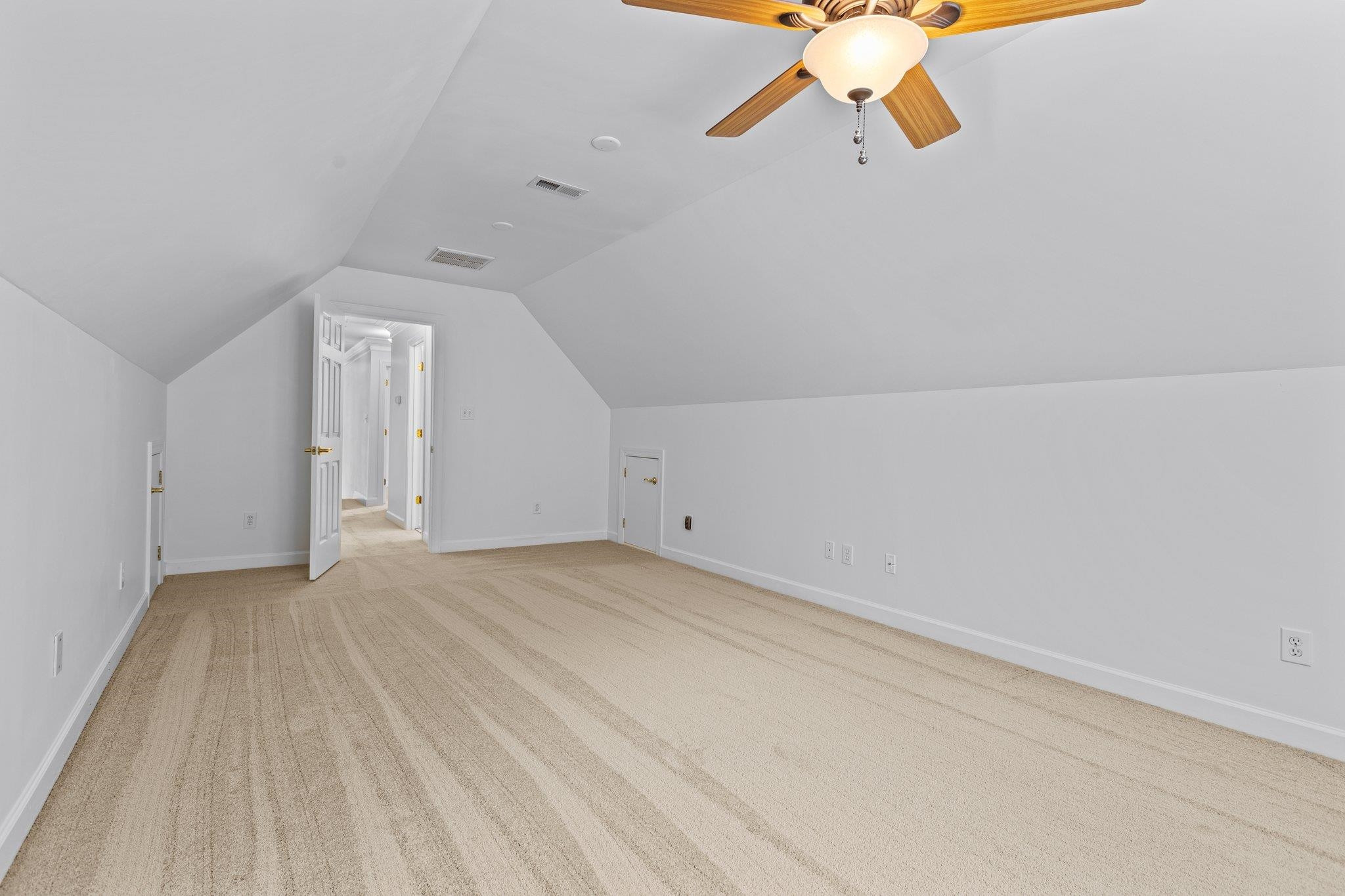 5105 Solemn Grove Road Garner, NC 27529 - Photo 25 of 30 The Bonus room has storage eaves on BOTH sides. Bonus Room