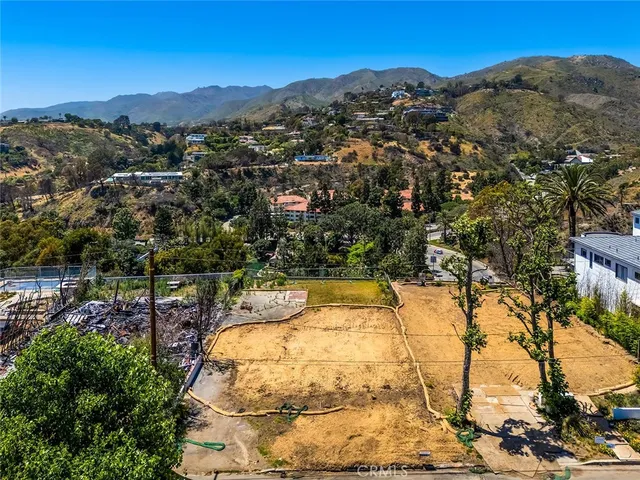 a view of a swimming pool with a lake view