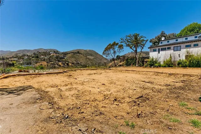 a view of a lake with a mountain