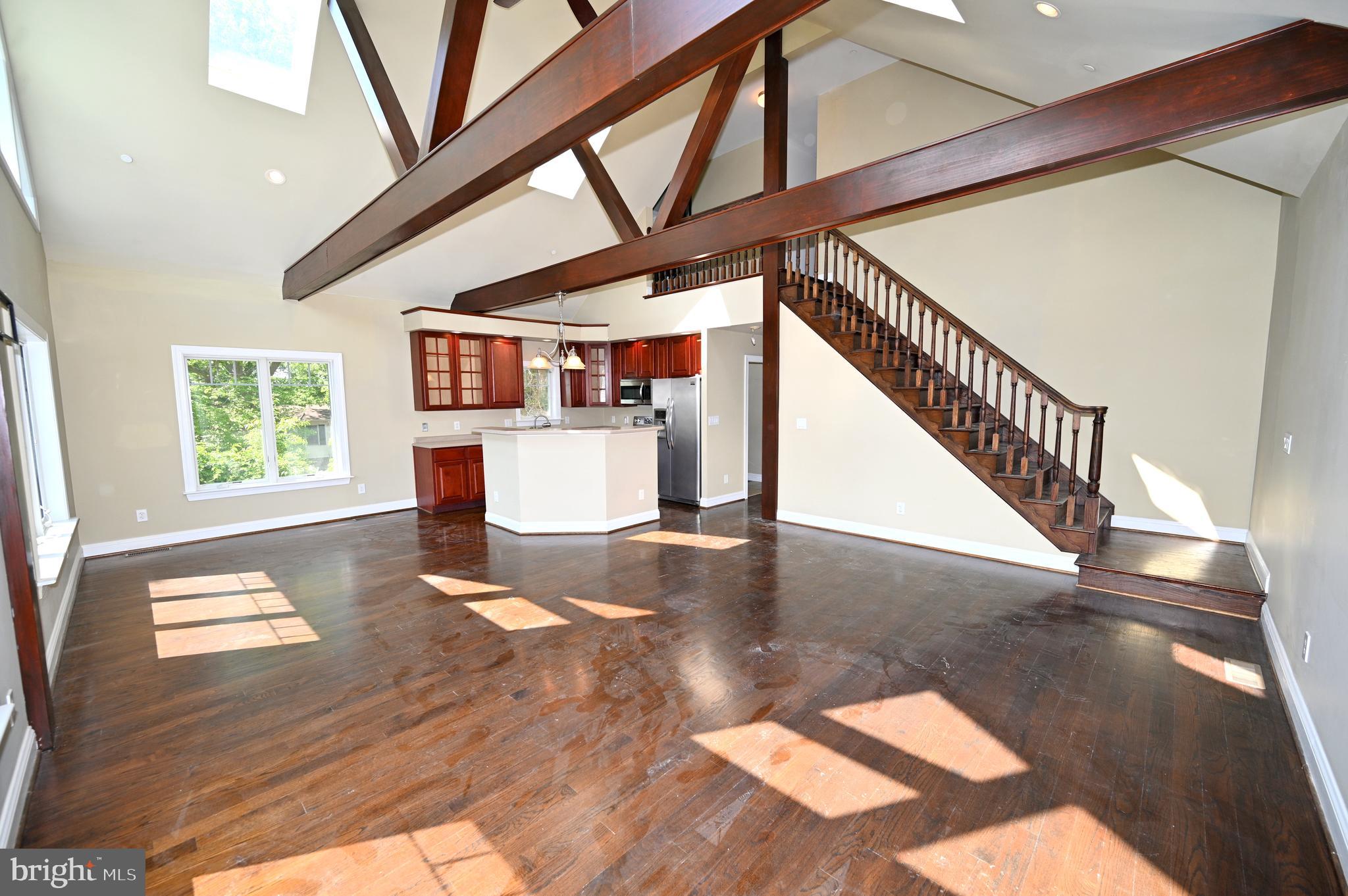37406 River Springs Road Avenue, MD 20609 - Photo 52 of 83 Living room with stairs going up