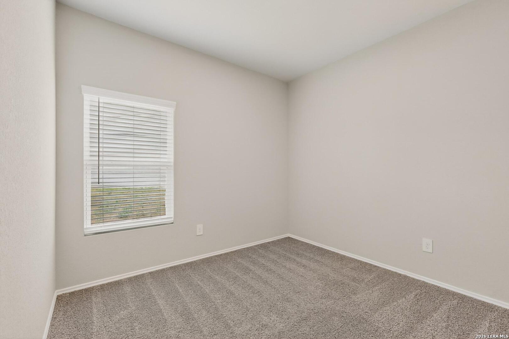 3038 Laguna Cliffs Converse, TX 78109 - Photo 21 of 32 an empty room with a window