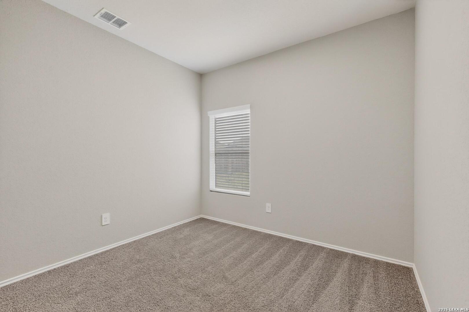 3038 Laguna Cliffs Converse, TX 78109 - Photo 22 of 32 an empty room with a window