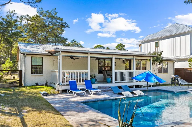 a view of house with outdoor seating space