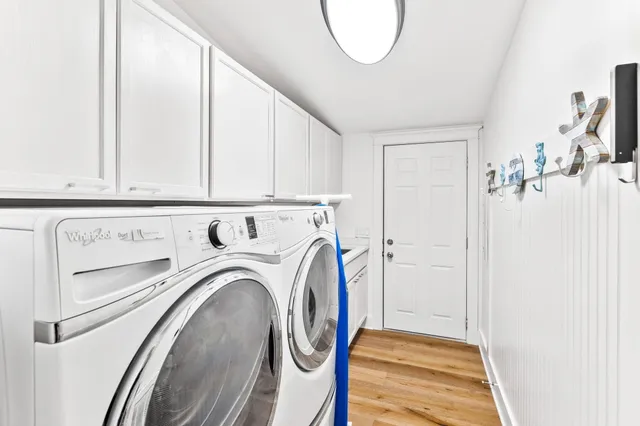 a front view of a house with a garage
