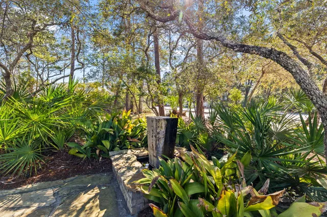 an aerial view of a house with a garden