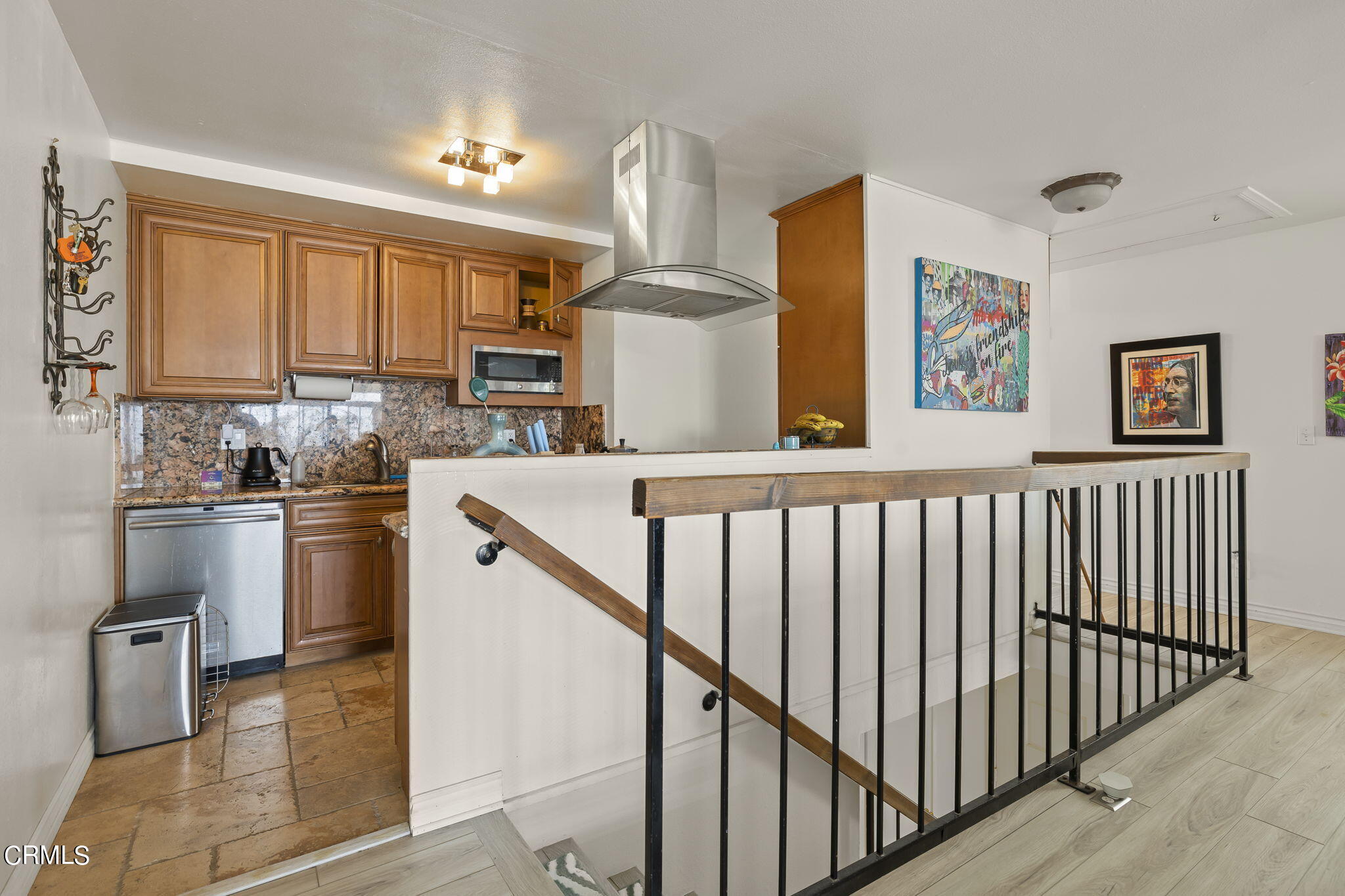 3551-3553 Sunset Lane Oxnard, CA 93035 - Photo 13 of 37 a kitchen with cabinets a sink and appliances