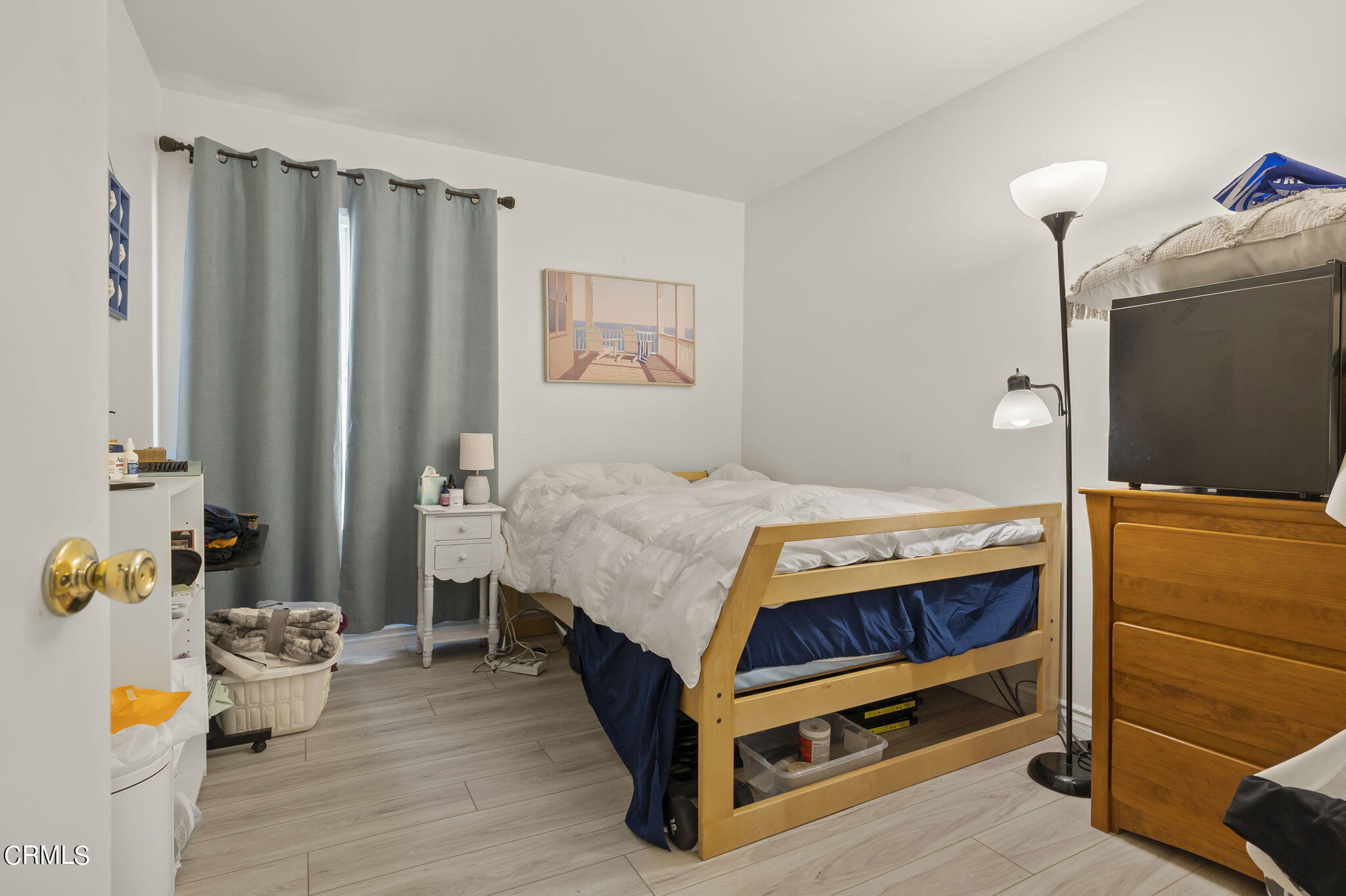 3551-3553 Sunset Lane Oxnard, CA 93035 - Photo 14 of 37 a bedroom with a bed and a couch