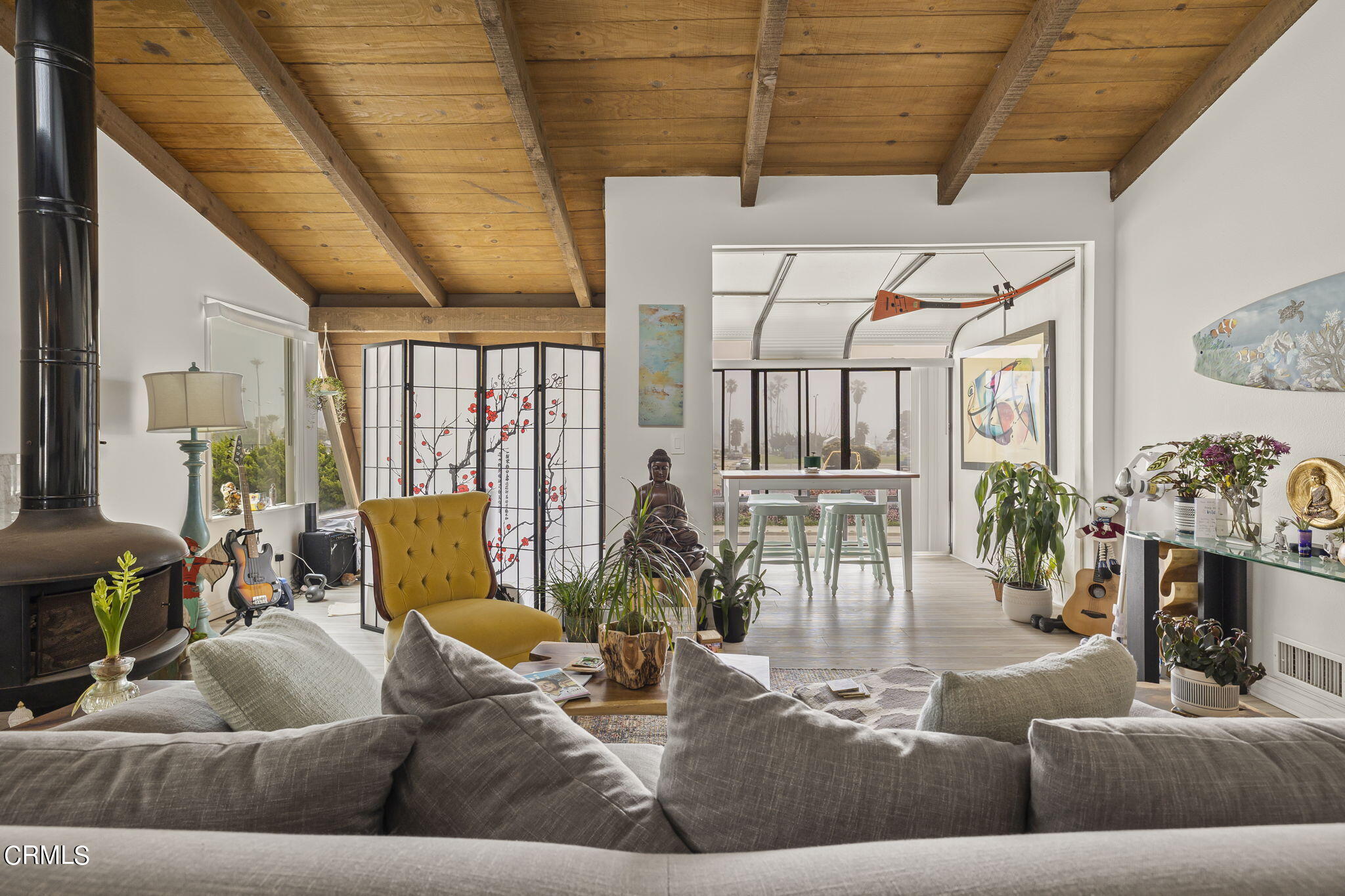 3551-3553 Sunset Lane Oxnard, CA 93035 - Photo 7 of 37 a living room with furniture and wooden floor