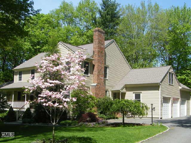 197 Old Stagecoach Road Ridgefield, CT 06877 - Photo 1 of 1 a view of a house with a yard