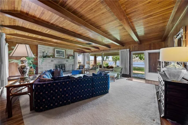 a bed room with furniture and a window