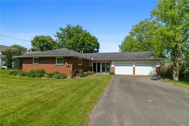 front view of a house and a yard