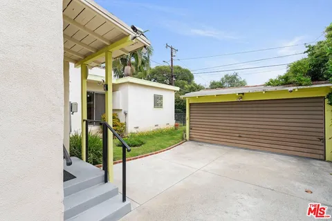 a view of a house with a garage