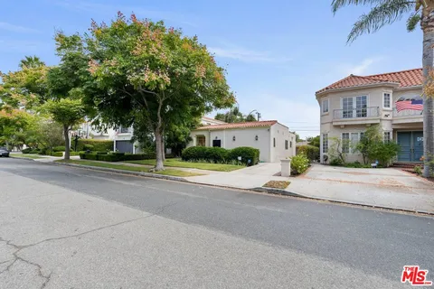 front view of a house with a street