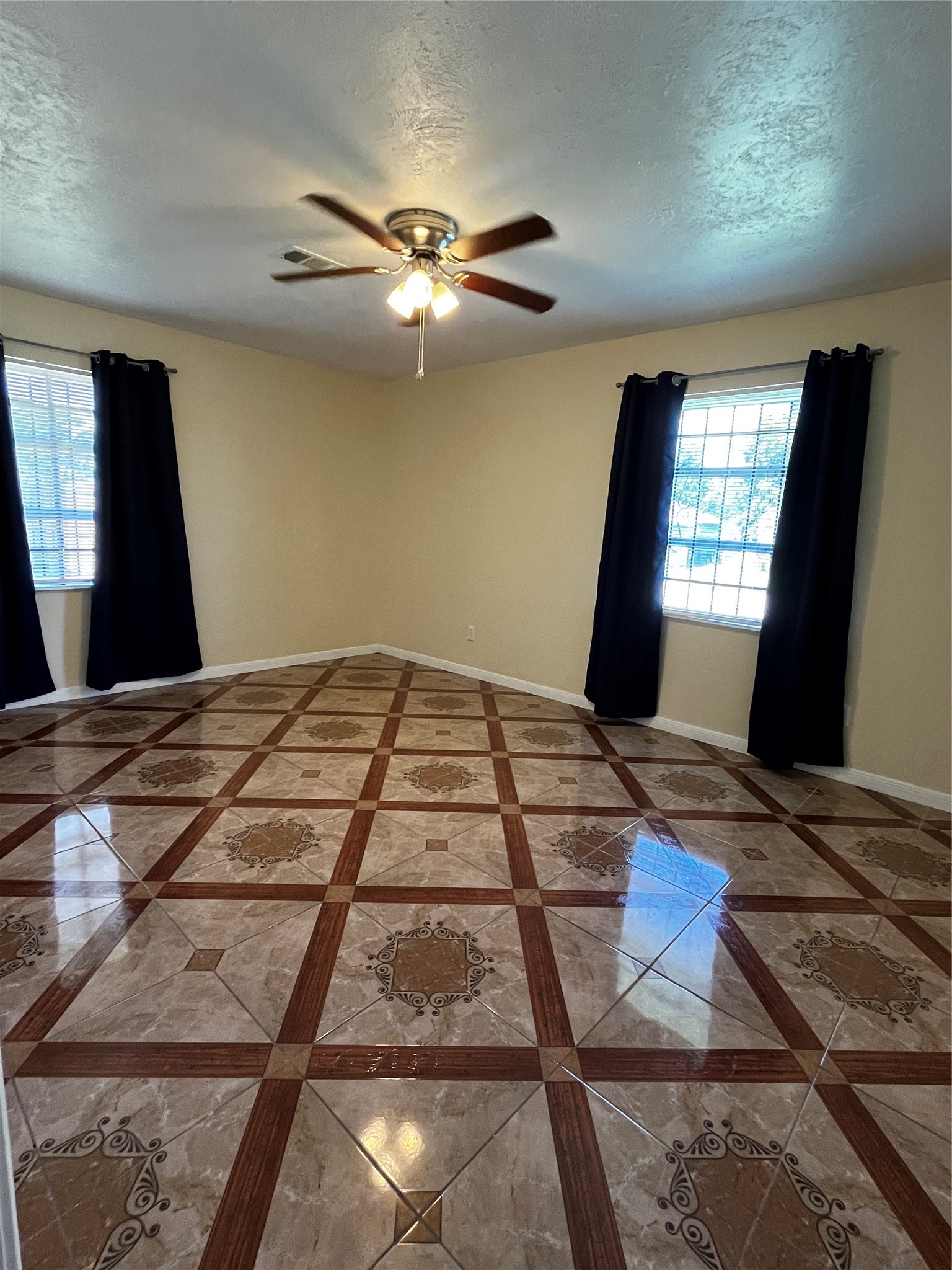 3163 Roe Drive Houston, TX 77087 - Photo 42 of 47 a bedroom with a bed and a flat screen tv
