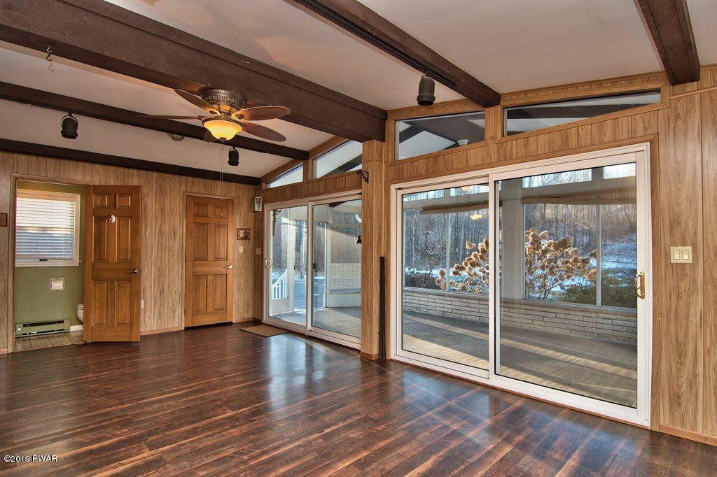 88 Moore Road Lake Ariel, PA 18436 - Photo 14 of 56 Family Room open to sunroom