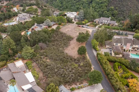 an aerial view of residential house with outdoor space