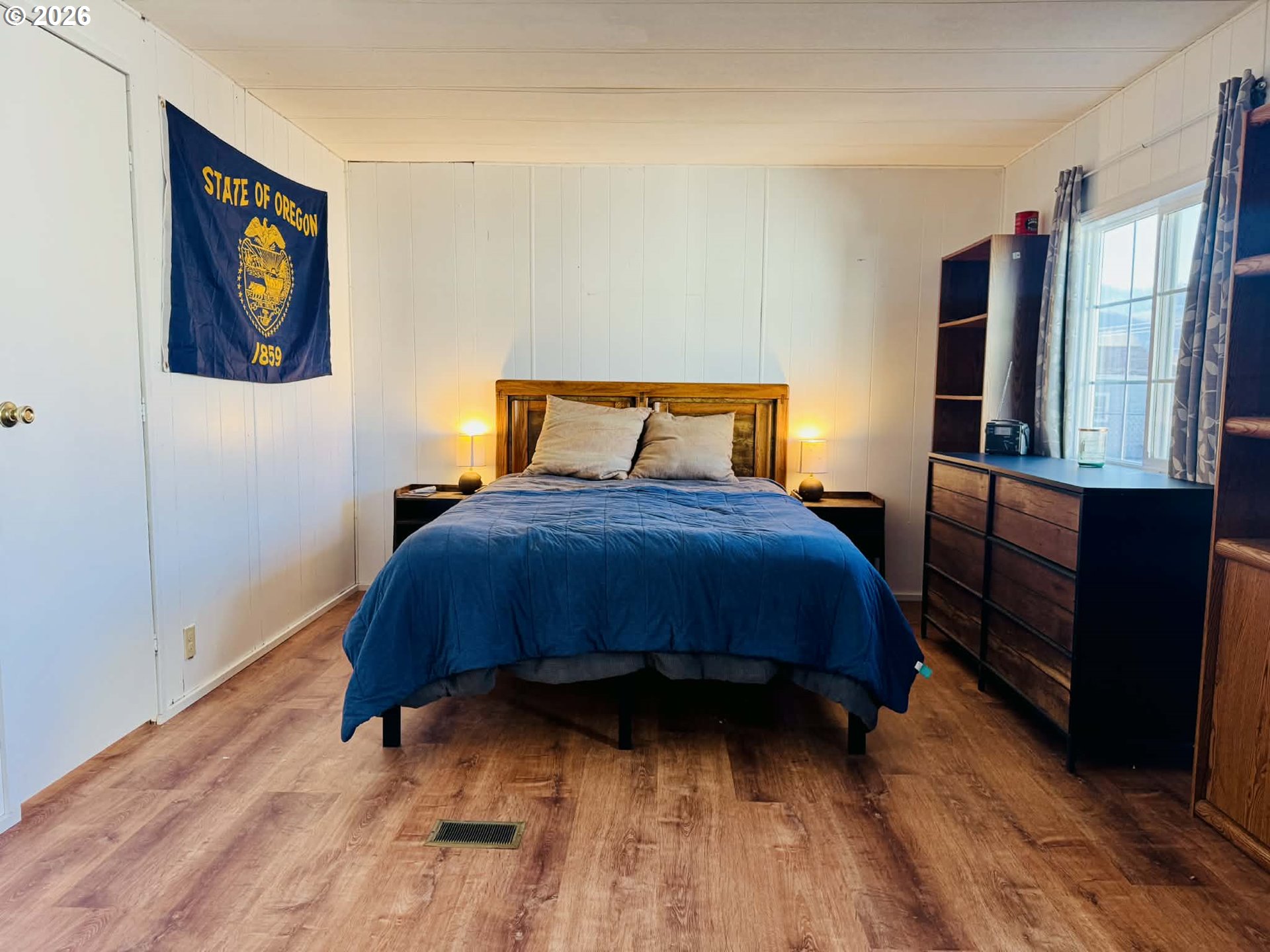 1020 South 2nd Street Union, OR 97883 - Photo 12 of 37 a bed sitting in a bedroom next to a cabinet
