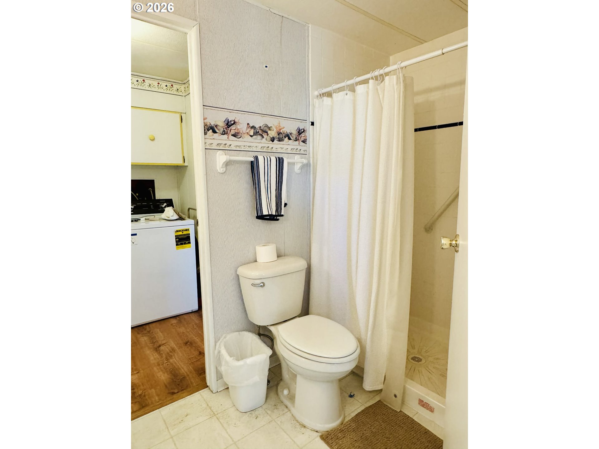 1020 South 2nd Street Union, OR 97883 - Photo 20 of 37 a white toilet sitting next to a bathroom sink